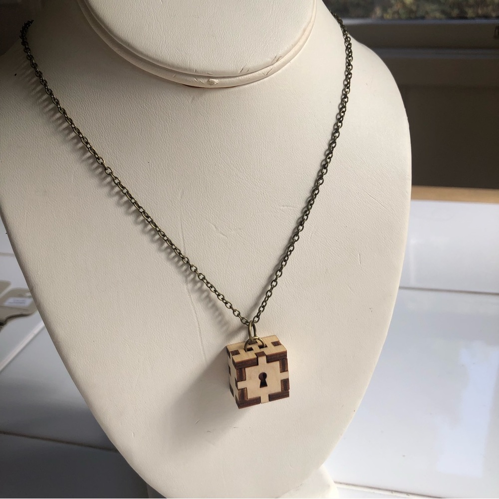NWT Unpossible Cuts ‘Lock Box’ laser cut wood pendant on brass necklace